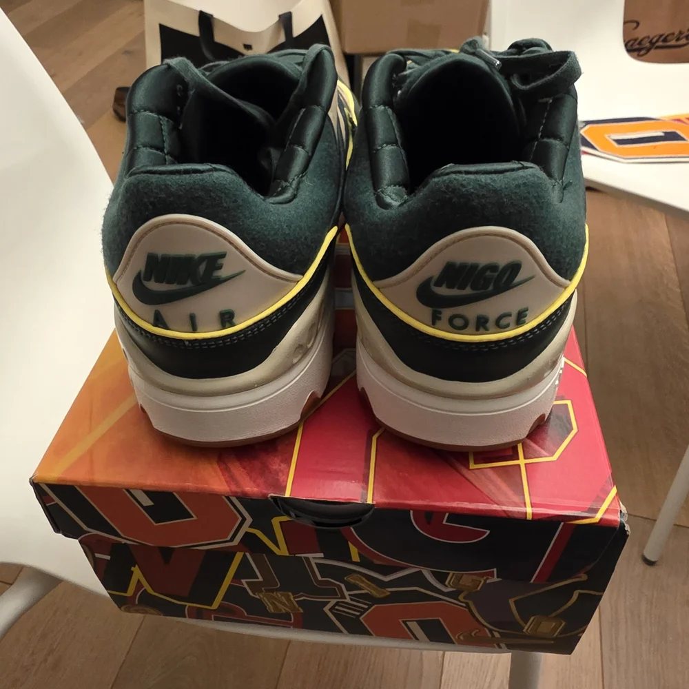 Nike: Nigo X Air Force 3 SP College Pack Forest Green.
